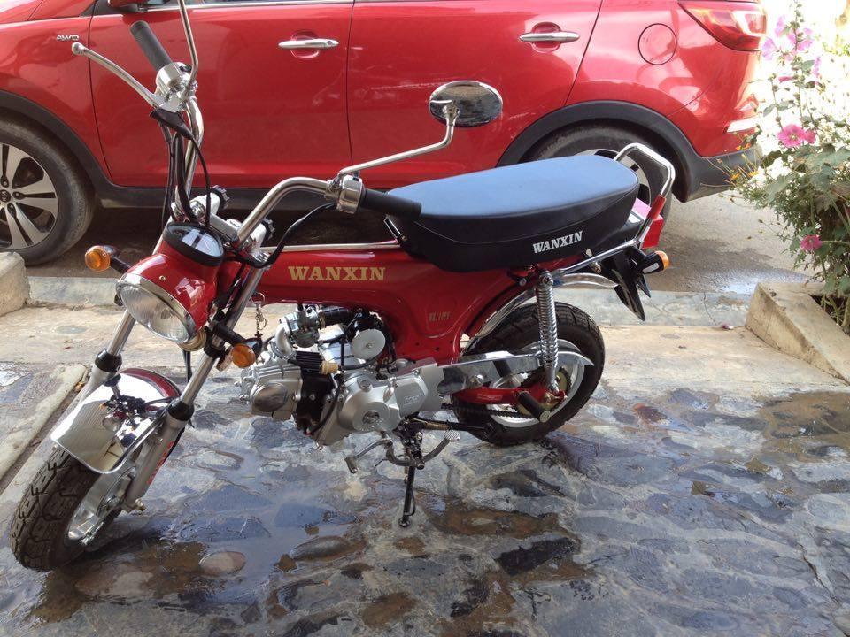 se vende una moto wanxin 110, color rojo, papeles en regla, por motivo de urgencia precio a tratar