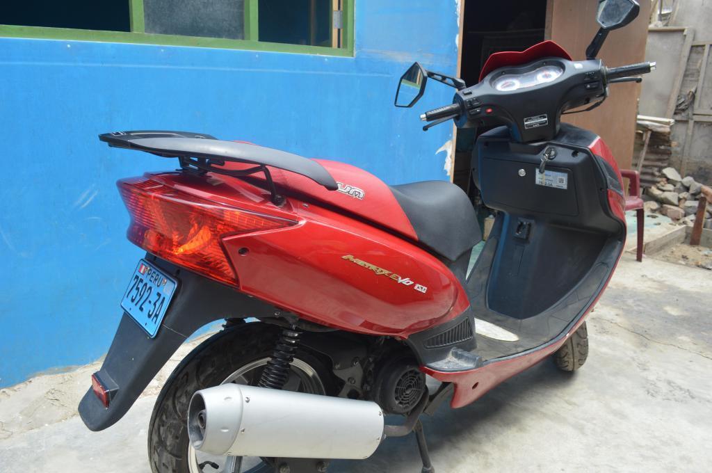 Moto Scooter, por viaje
