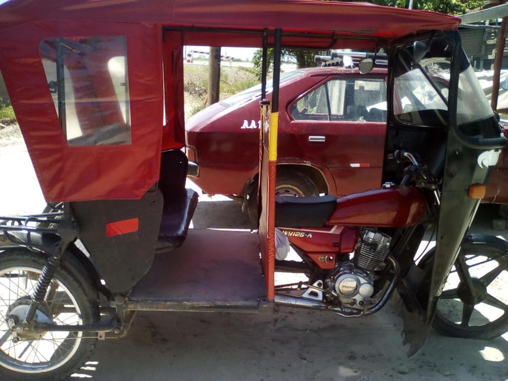 se vende mototaxi HONDA operativa con motor nuevo marca WANXIN inscrito en registros publicos