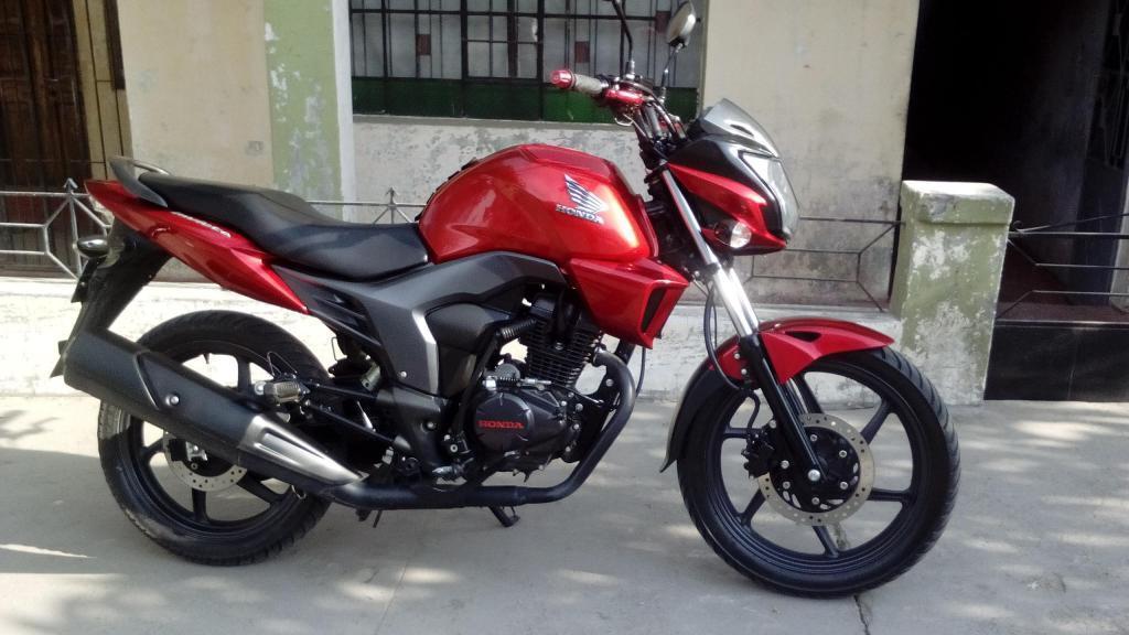 Vendo moto HONDA color rojo